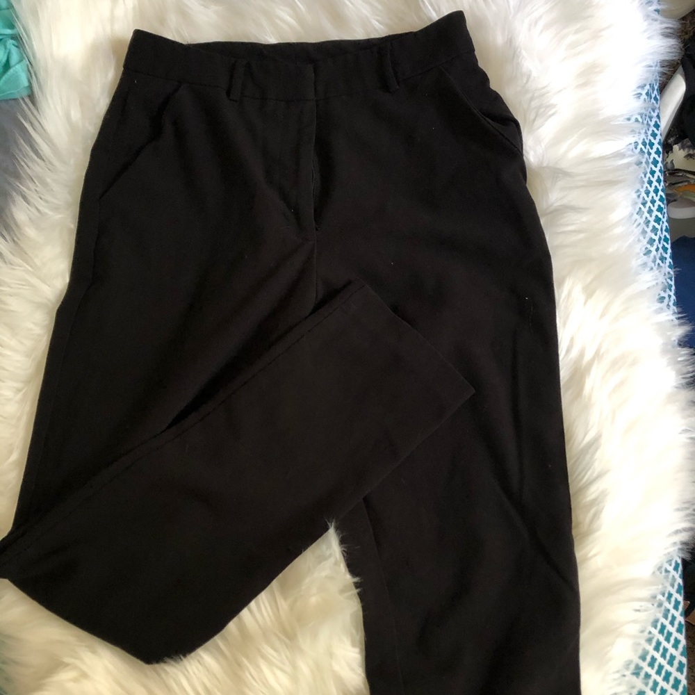 Black slacks. Slim fit